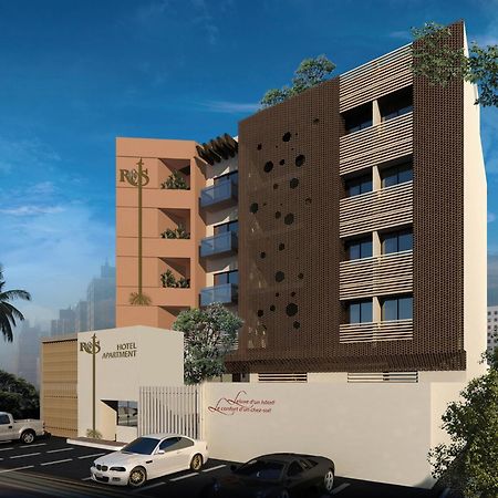 Roots Hotel Apartments อาบีจาน ภายนอก รูปภาพ