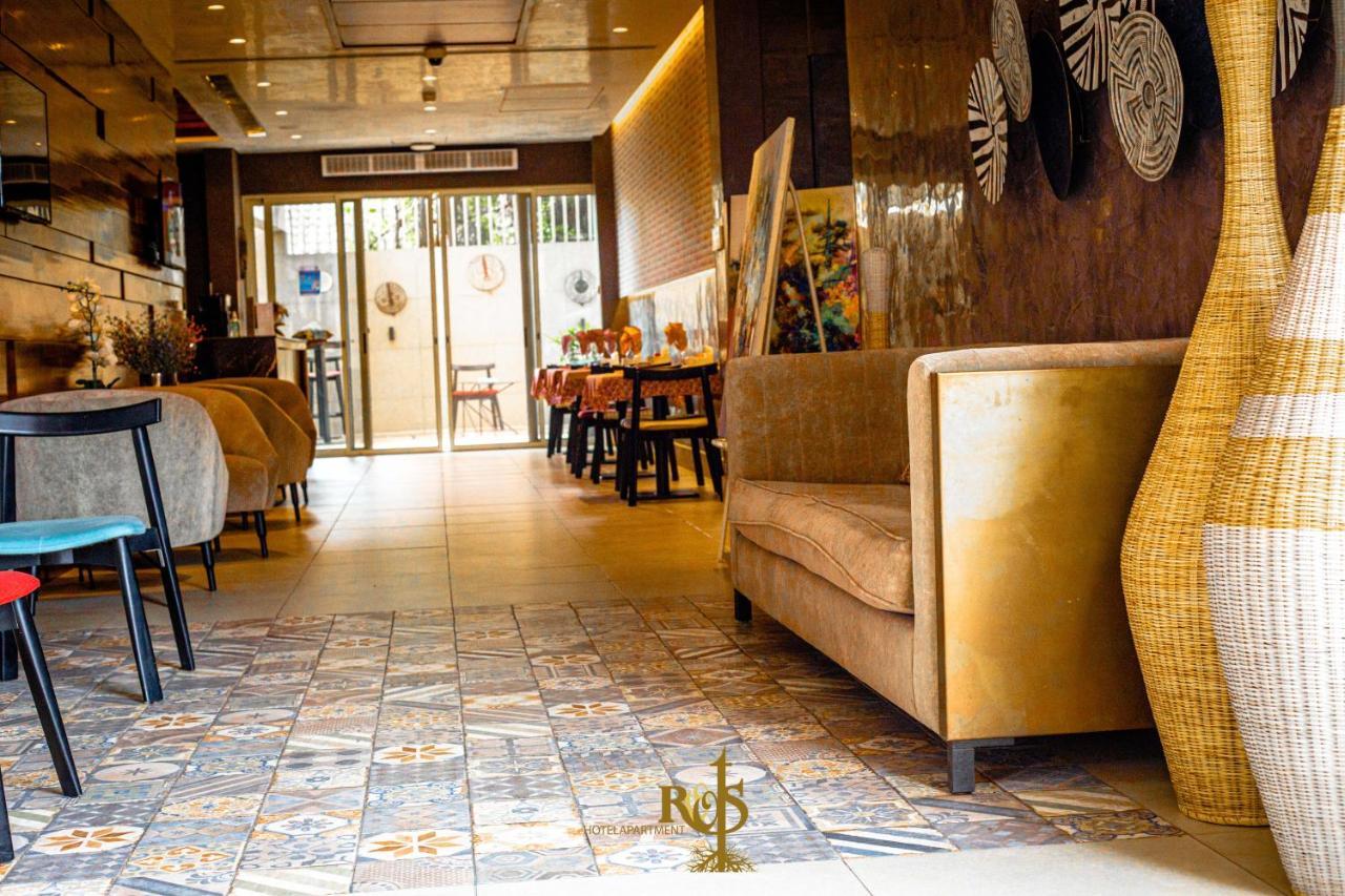 Roots Hotel Apartments อาบีจาน ภายนอก รูปภาพ